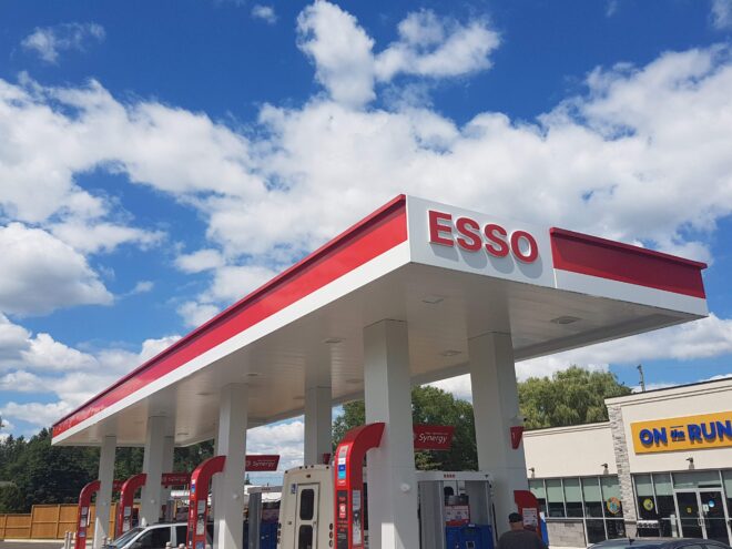 Lit formed plastic ESSO letters, red face with white returns illuminated