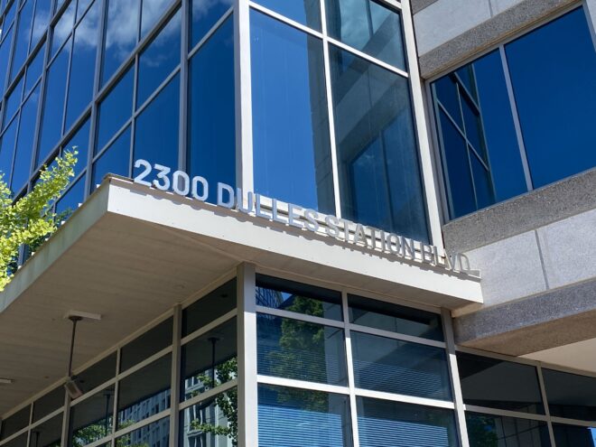 Freestanding 10” tall stainless steel letters on building exterior