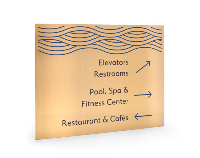 Brass thin gauge metal sign indicating sections of a hotel and where to go